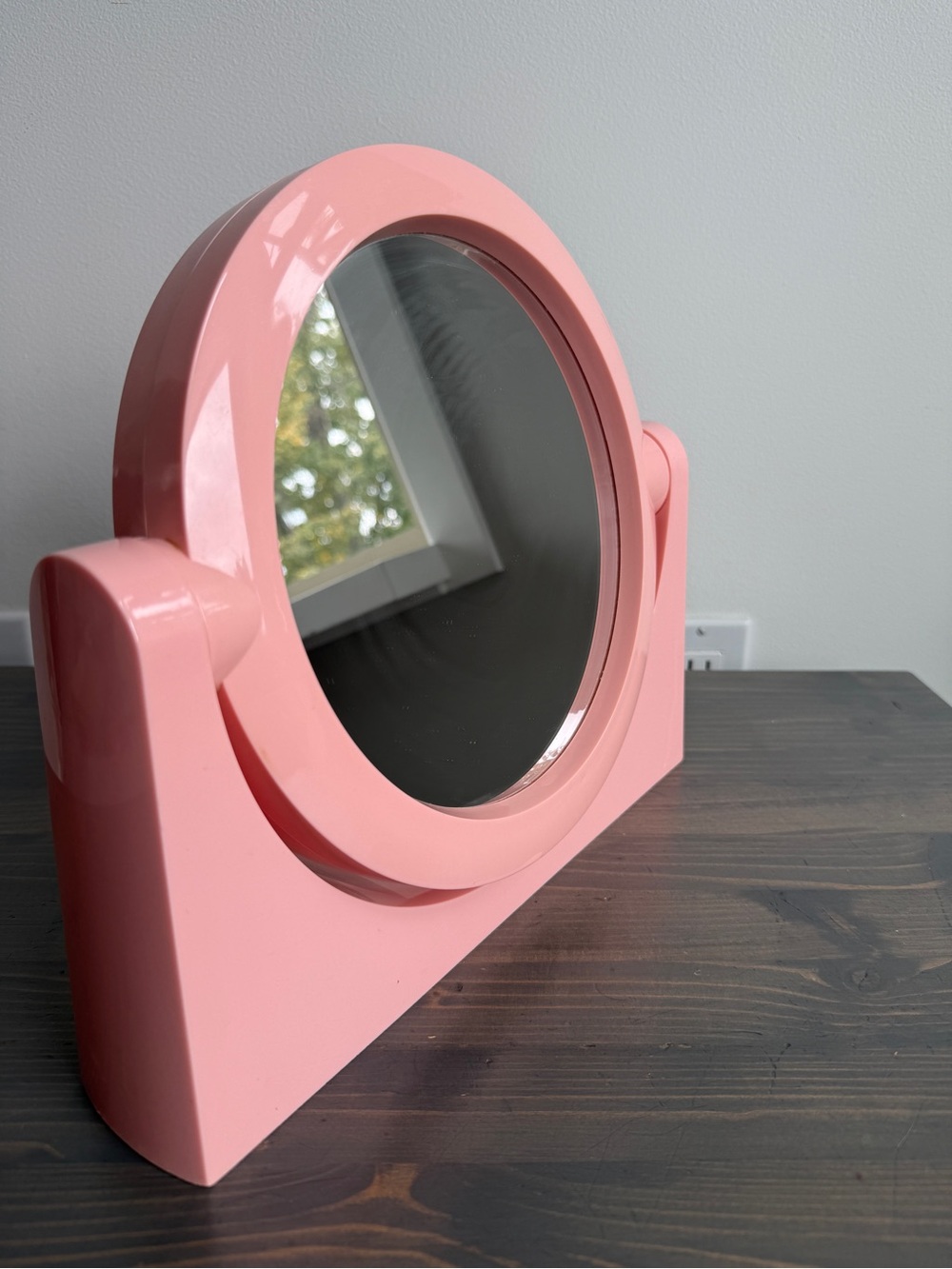 Vintage pink plastic bathroom mirror